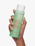 Clarins Purifying Toning Lotion lozione tonica detergente nutriente unisex da 200 ml