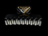 Prada hair clips nera in metallo